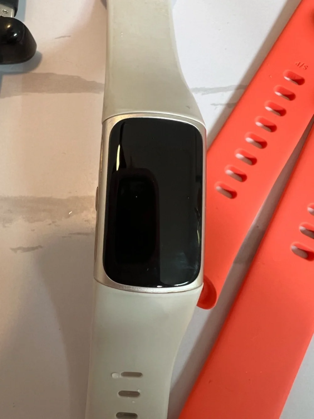 Google Fitbit Charge 6 Color: Coral/Champagne Gold Aluminum White bands Charger